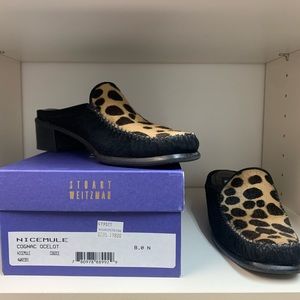 Lightly worn Nicemule flats in cognac ocelot.